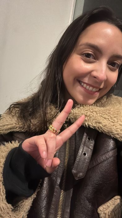 Miembro de la comunidad Premia2 con su premio