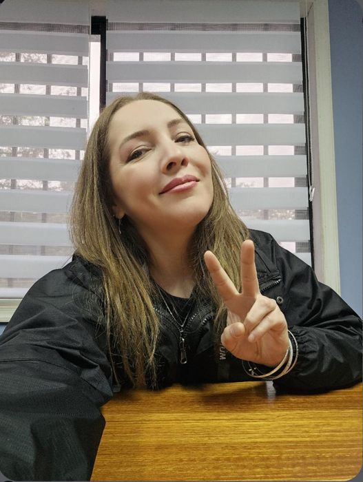Miembro de la comunidad Premia2 con su premio