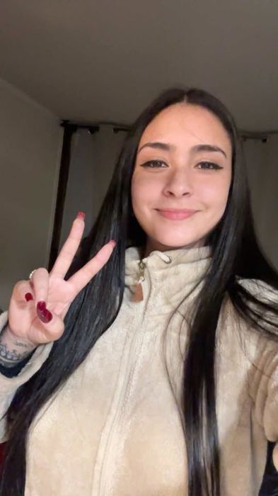 Miembro de la comunidad Premia2 con su premio