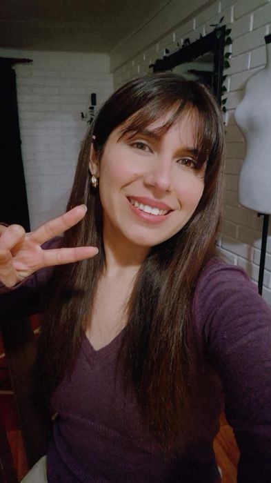 Miembro de la comunidad Premia2 con su premio